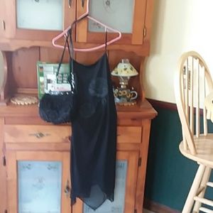 Black dress with rose sequence and black purse